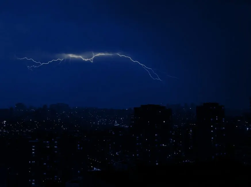 Captivating view of lightning striking over Istanbul's skyline at night, showcasing a dramatic and electrifying atmosphere.